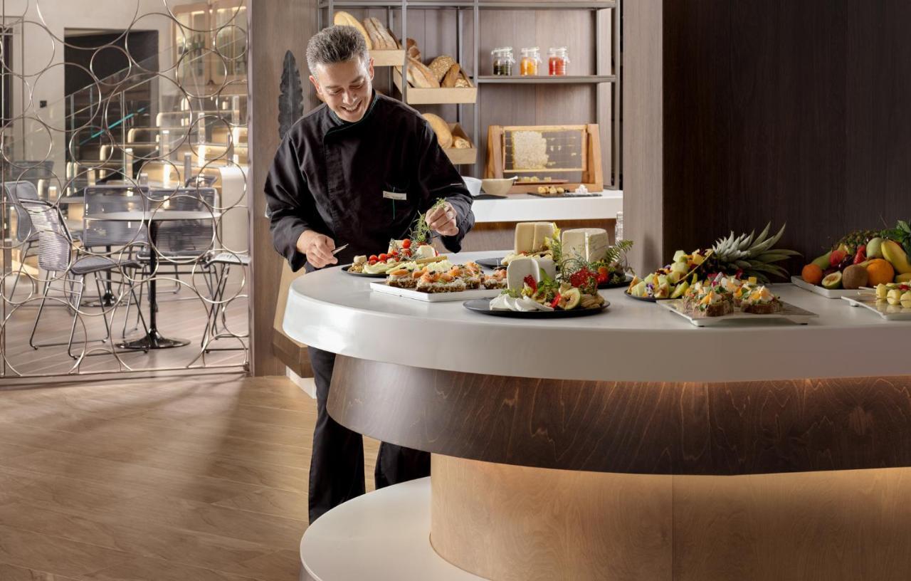 Nautilux Rethymno By Mage Hotels Экстерьер фото A chef at work