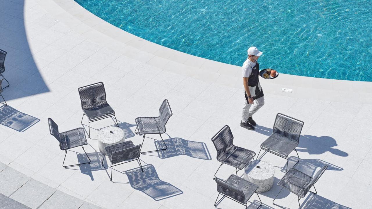 Nautilux Rethymno By Mage Hotels Экстерьер фото The poolside at the Four Seasons Hotel, Milan